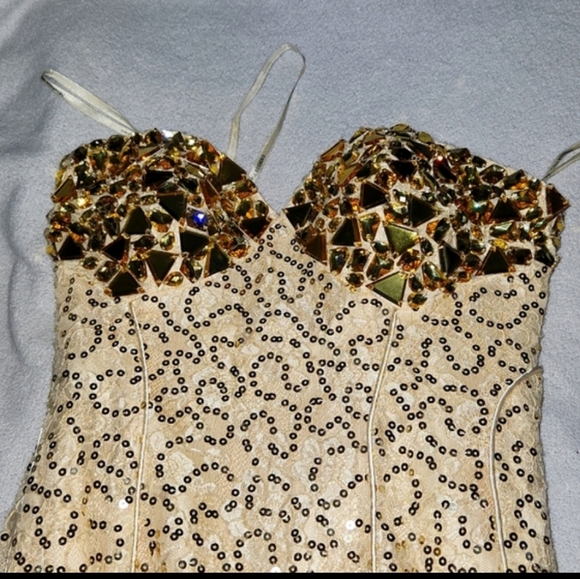 Dresses & Skirts - Mermaid GOLD Prom Dress. Size 4. Ony worn once. Crystal bodice. Tule skirt.